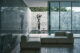 Η διαχρονικότητα ως στάση ζωής στη Zara Home+ Collection 04 Σε έναν κόσμο που αλλάζει με ιλιγγιώδεις ρυθμούς, η σταθερότητα δεν βρίσκεται πια στην ακινησία, αλλά στην αυθεντικότητα. Η Zara Home+ by Vincent Van Duysen | Συλλογή 04 αποτελεί την ήσυχη δύναμη ενός design που επιλέγει να εμβαθύνει αντί να εντυπωσιάσει, να αφηγηθεί αντί να φωνάξει. Πρόκειται για τη συνέχεια μιας σχεδιαστικής αφήγησης που ξεκίνησε το 2022 και εξελίσσεται σε ένα αρμονικό σύμπαν, όπου το φως, η υφή και η μορφή συνδιαλέγονται σιωπηλά. Το τέταρτο αυτό κεφάλαιο δεν αποσκοπεί στο να ανατρέψει τους κανόνες, αλλά να τους επαναδιατυπώσει με έναν πιο απτικό, πιο συναισθηματικό τρόπο. Οι γραμμές γίνονται πιο απαλές, οι φόρμες απελευθερώνονται και η αφή αποκτά σχεδόν πρωταγωνιστικό ρόλο. Ο μοντερνισμός εδώ δεν είναι ψυχρός, αλλά οργανικός· βαθύς, αλλά όχι βαρύς. Στο επίκεντρο της συλλογής, το Sofa 02 επαναπροσδιορίζει την έννοια της ευελιξίας. Ένα αρθρωτό σύστημα με καθαρές γραμμές και υλικά που μιλούν τη γλώσσα της διάρκειας, δέρμα, δρυς, απλότητα. Όχι για να εντυπωσιάσει, αλλά για να «κατοικήσει» τον χώρο με διακριτικότητα και ευφυΐα. Δίπλα του, το Daybed 02 στέκεται σαν γλυπτό που προσκαλεί σε παύσεις, ενώ το Lounge Chair 03 μας αγκαλιάζει κυριολεκτικά και αισθητικά, με μαξιλάρια που υπονοούν την πολυτέλεια μέσα από την άνεση. Ίσως η πιο τολμηρή χειρονομία της συλλογής να είναι το Coffee Table 02. Μια μεταλλική δοκός με καθαρές αναλογίες και παιχνιδιάρικες αντανακλάσεις, μια ενσώματη σύγχρονη σκέψη για το πώς ένα έπιπλο μπορεί να λειτουργεί ως sculpture in space. Ο φωτισμός, με το Lamp 03, γίνεται εργαλείο ατμόσφαιρας. Διακριτικό και ευέλικτο, ενσωματώνεται ή ξεχωρίζει, πάντα όμως εξυπηρετώντας μια φιλοσοφία: το design πρέπει να αναδεικνύει και όχι να επισκιάζει. Το Rug 04 και τα Accessories 04 έρχονται να ολοκληρώσουν τη συλλογή σαν υπόγειες νότες. Το χαλί, με τις ρηγματώσεις του, θυμίζει τη γη, όχι μόνο σαν υφή, αλλά και σαν υπόμνηση επιστροφής σε έναν πιο στοχαστικό ρυθμό ζωής. Όσο για τα διακοσμητικά στοιχεία, είναι εκεί όχι για να προσθέσουν, αλλά για να συγκινήσουν: ένας φόρος τιμής στην προσωπική ιστορία του σχεδιαστή και μια υπενθύμιση πως ο χώρος που ζούμε δεν είναι απλώς ένας τόπος, αλλά μια αφήγηση. Η Zara Home+ by Vincent Van Duysen | Συλλογή 04 δεν αναζητά την επικαιρότητα. Αντίθετα, αναδεικνύει τη διαχρονικότητα μέσα από υλικά που "μιλούν", γραμμές που δεν κραυγάζουν και λεπτομέρειες που προσκαλούν στην παρατήρηση. Είναι μια ωδή στην απλότητα που δεν φοβάται το βάθος. Μια συλλογή που δεν κατοικεί μόνο στους χώρους μας, αλλά και στον τρόπο που θέλουμε να ζούμε.